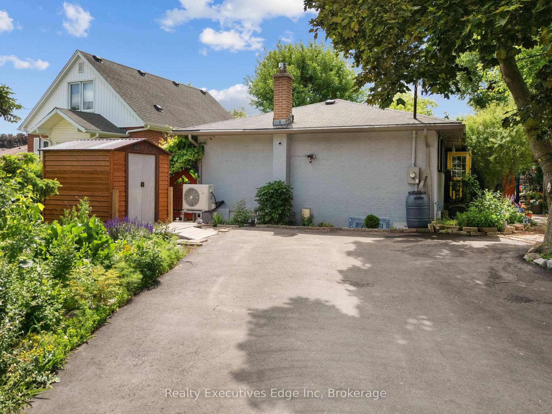 A COTTAGE IN THE CITY Welcome to 309 Southill Drive, a nature lovers paradise with urban convenience in the heart of Kitchener.