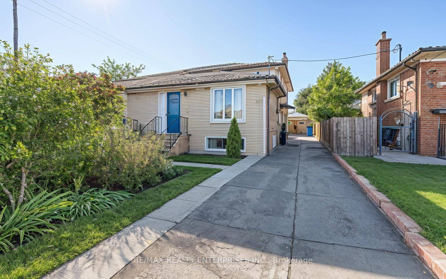 Welcome Home to this Lovely 4 1 Bedroom, 3 Bath Semi Detached 5 Level Backsplit Home !