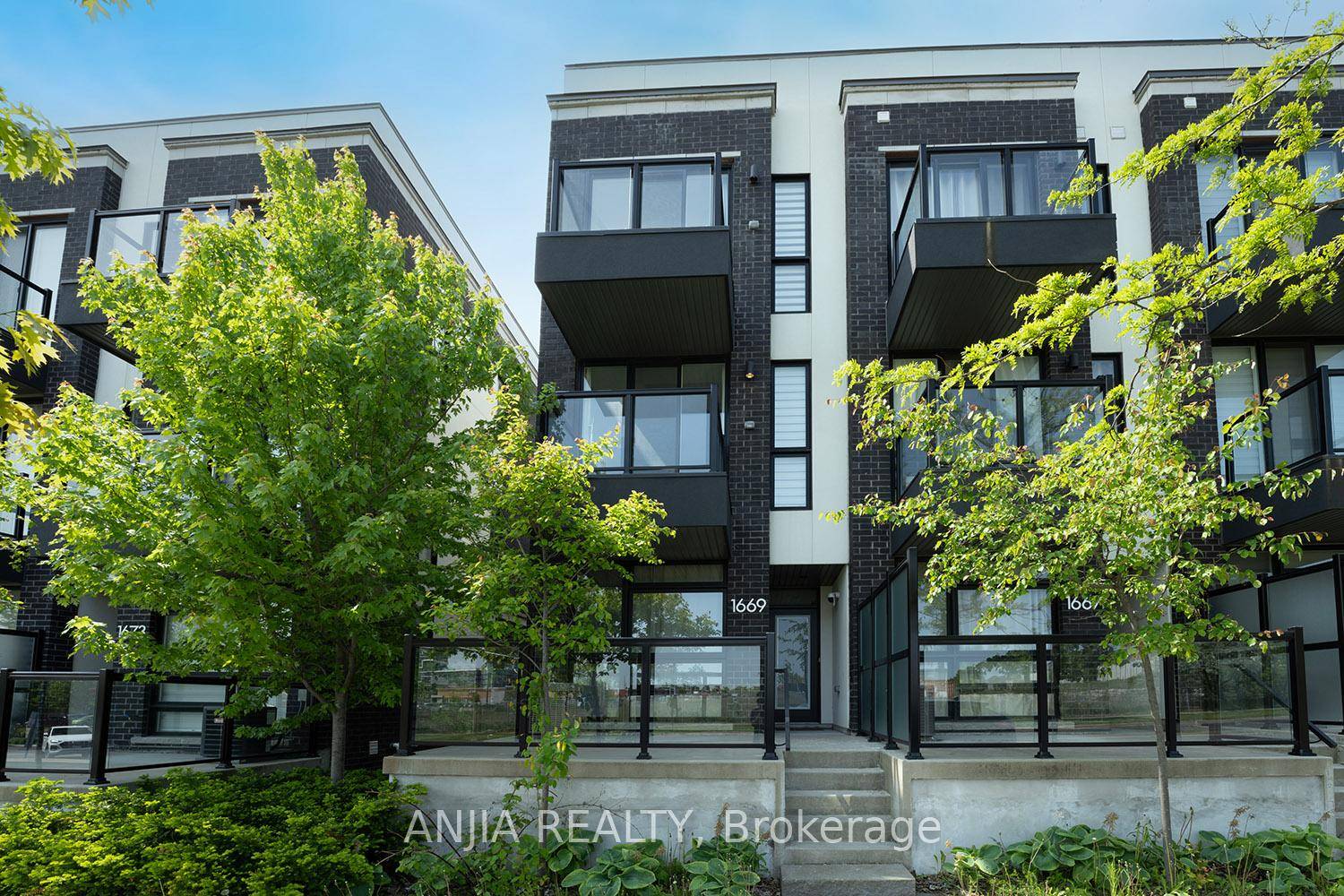 Modern 3 Storey End Unit Townhouse by Aspen Ridge in the Desirable Wismer Community.