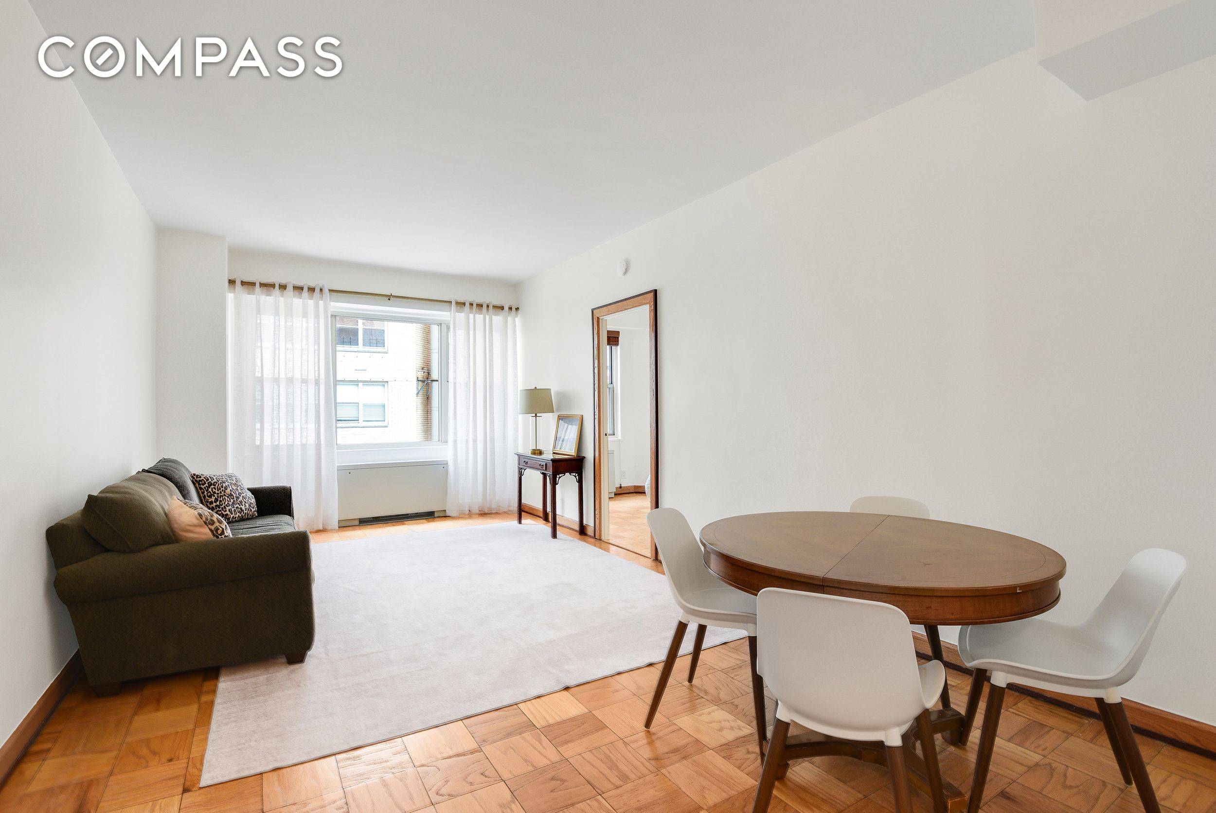 Residence 10P is a north facing one bedroom one bathroom home in a full service co op in Lenox Hill This spacious apartment offers versatility and convenience with a separate ...