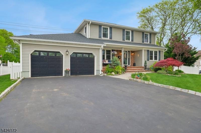FANTASTIC OPPORTUNITY TO OWN A MOVE IN READY COLONIAL HOME IN CLARK !