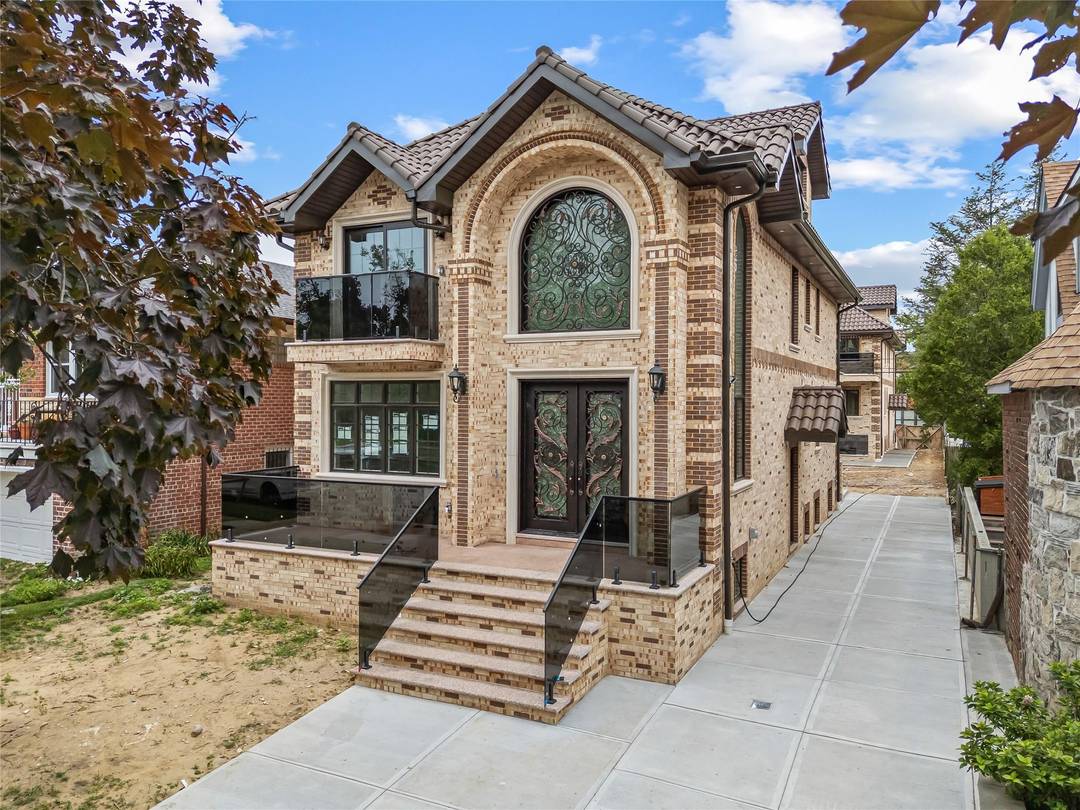 Welcome to this beautifully updated all brick home in the heart of Flushing.