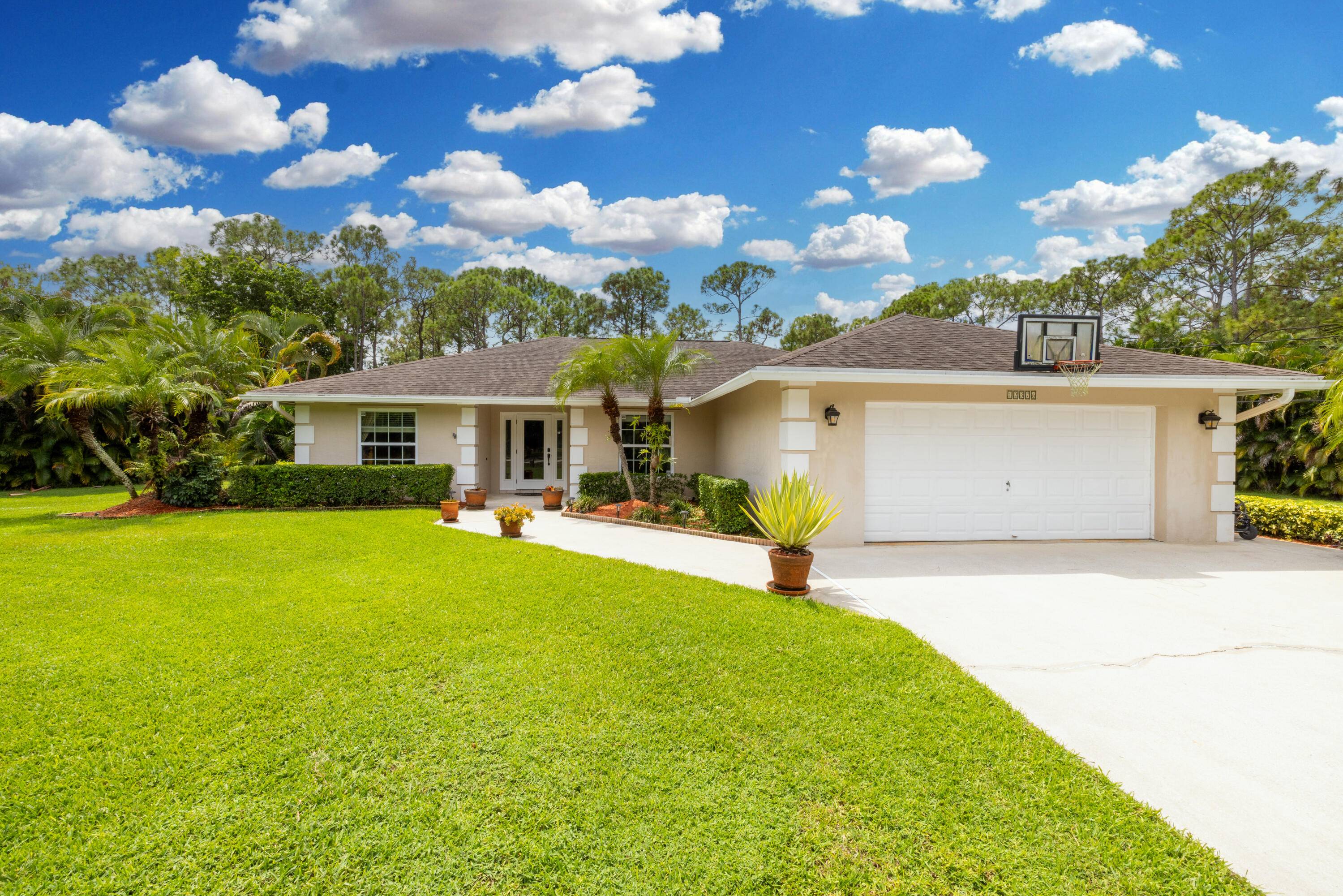 Welcome to this extremely well cared for and maintained 4 bedroom, 2 bath home on an oversized 1.