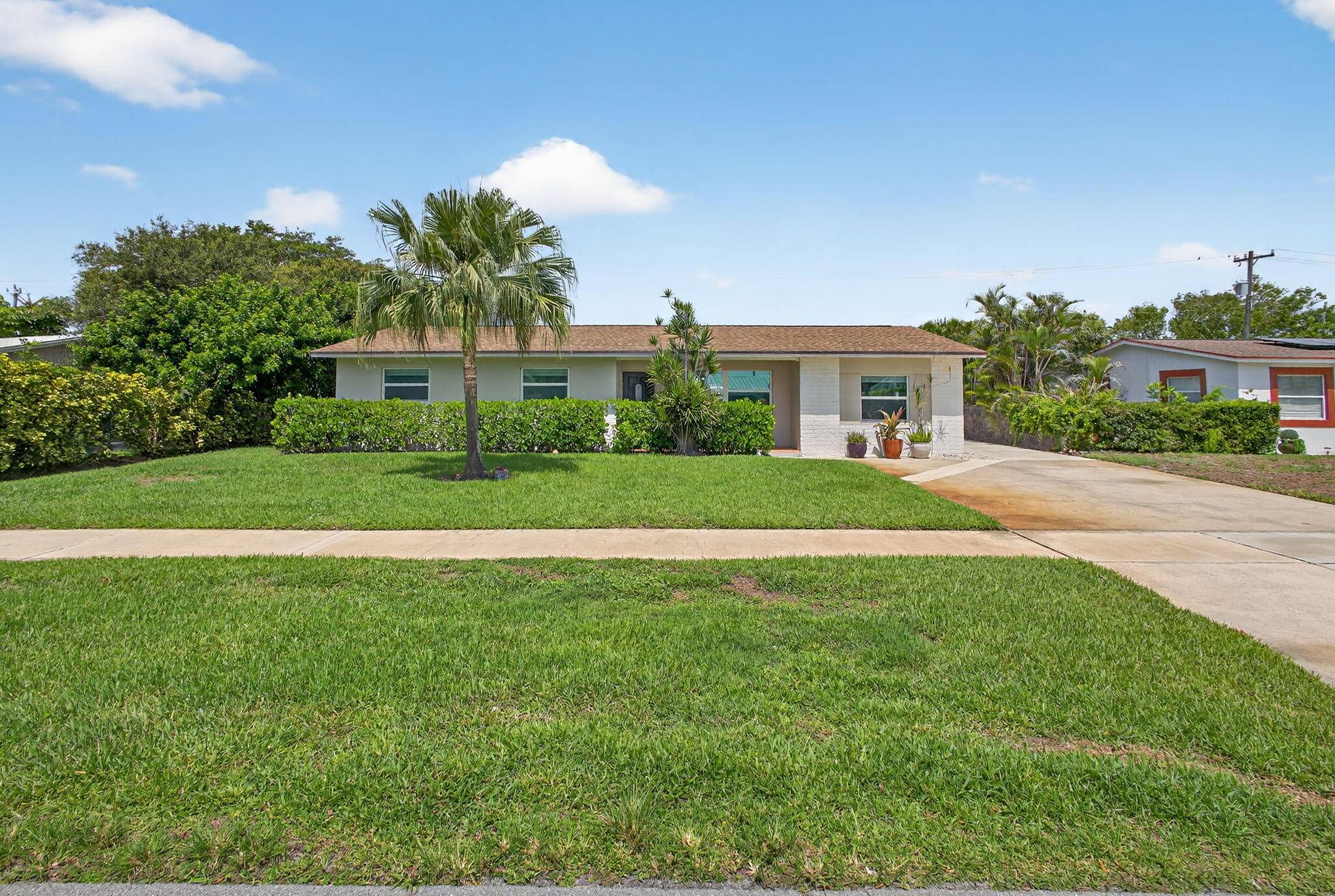 704 Juniper Drive Single-Family Palm Beach
