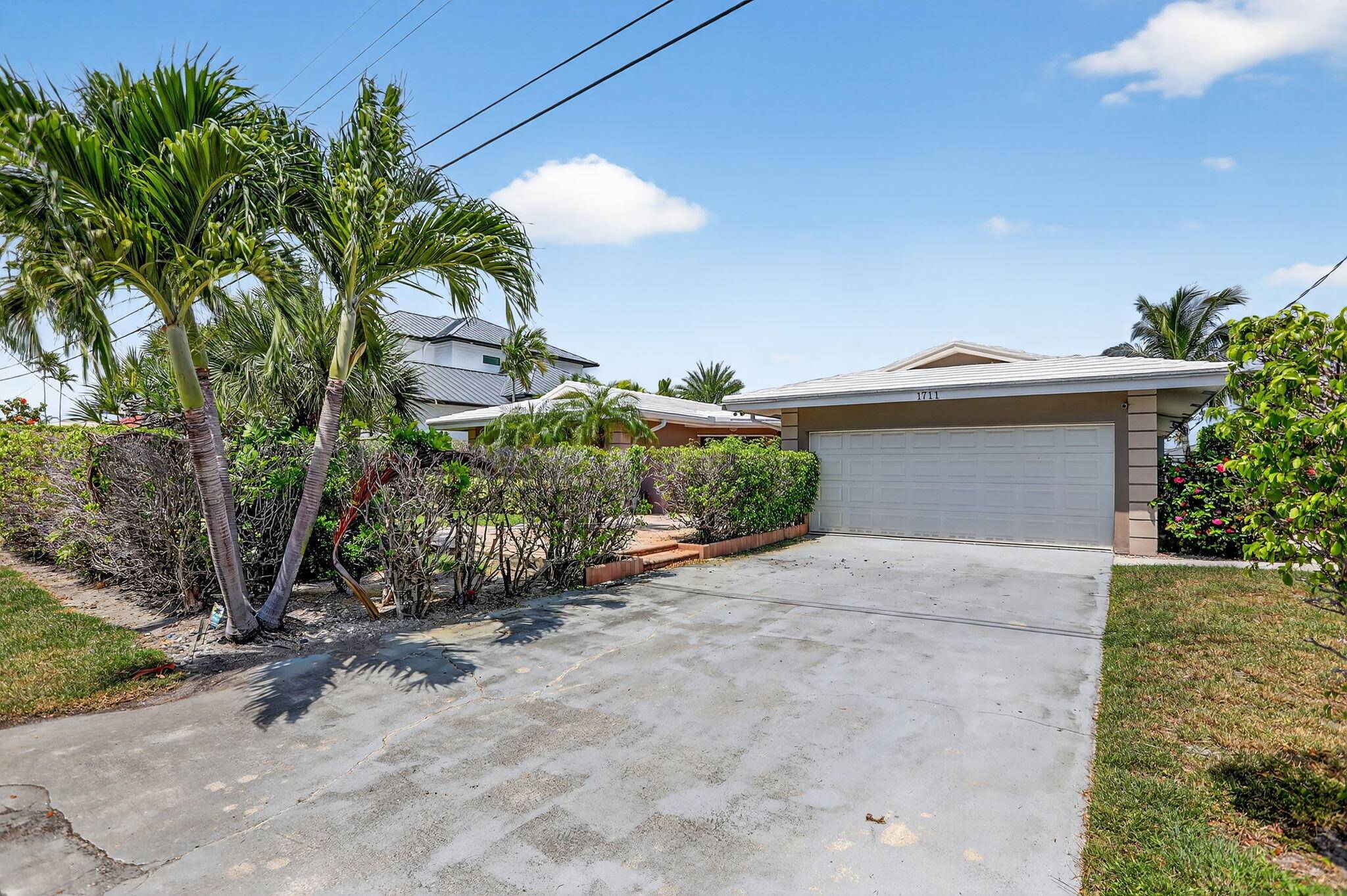 Experience the pinnacle of South Florida coastal living in this impeccably maintained single story deepwater estate, offering 90 feet of prime Intracoastal frontage, a sparkling heated private pool, and the ...