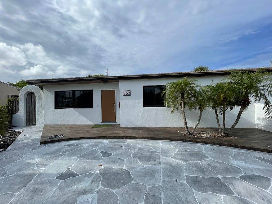 YOUR PRIVATE OASIS ONLY STEPS FROM THE INTRACOASTAL AND THE TRANQUIL WALK ALONG FLAGLER COMPLETELY UPDATED 3 2 W PRIVATE POOL SURROUNDED BY LUSH TROPICAL LANDSCAPE FOR YOUR PRIVACY EASY ...