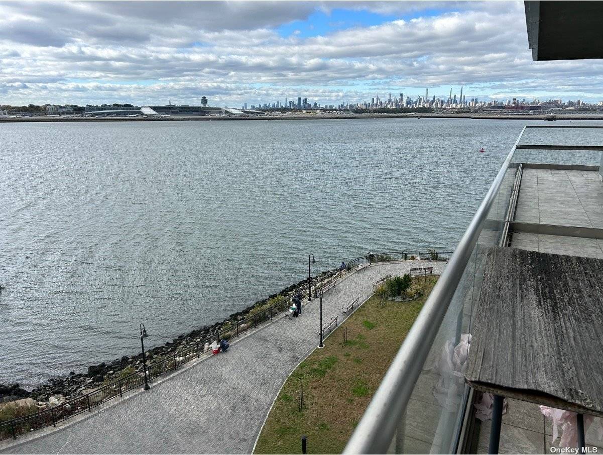 2 Bed 2 Bath with private balcony in a luxury condo building with indoor parking garage.