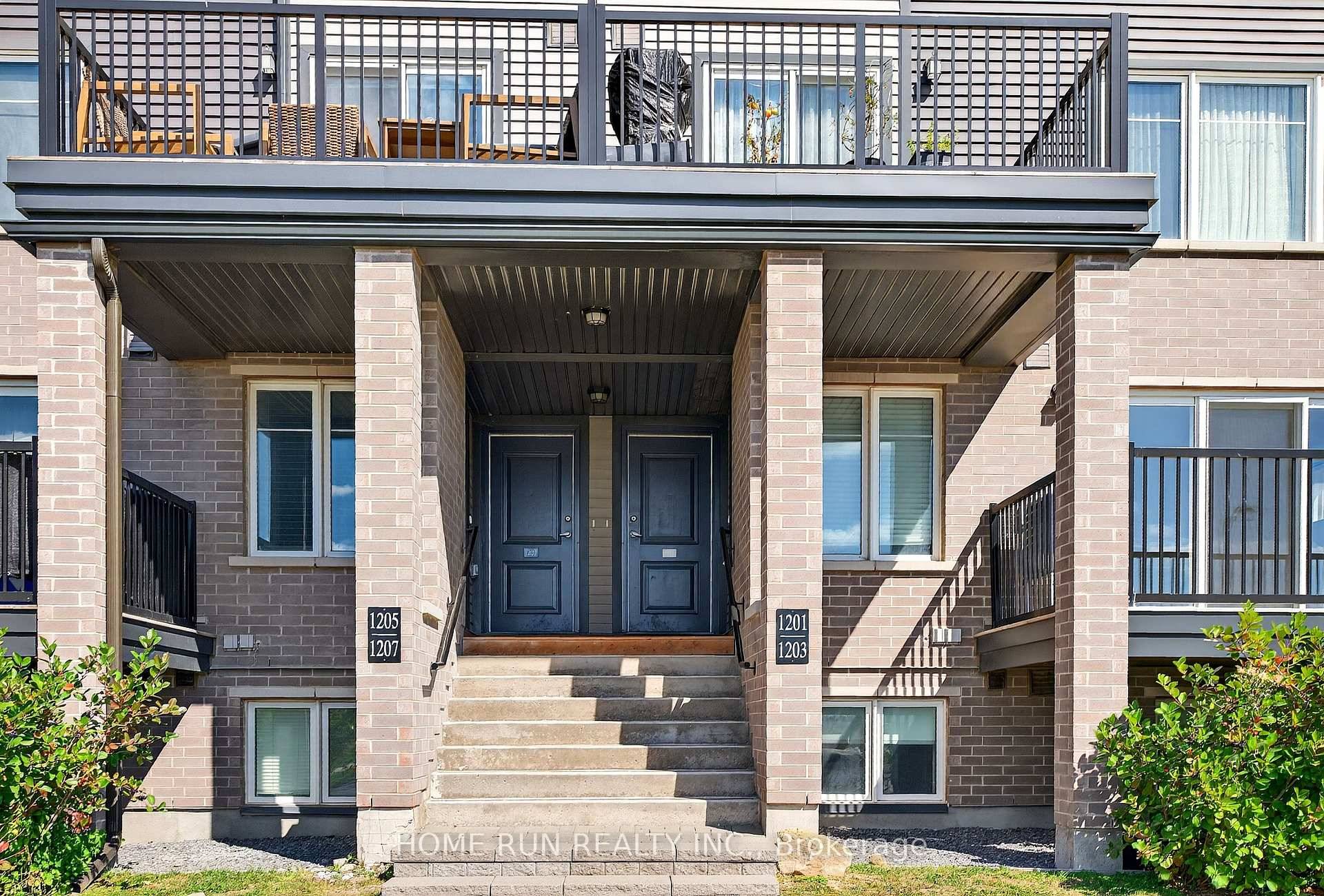 A modern 2 bedroom condo terrace with a large balcony is located in Harmony Barrhaven.