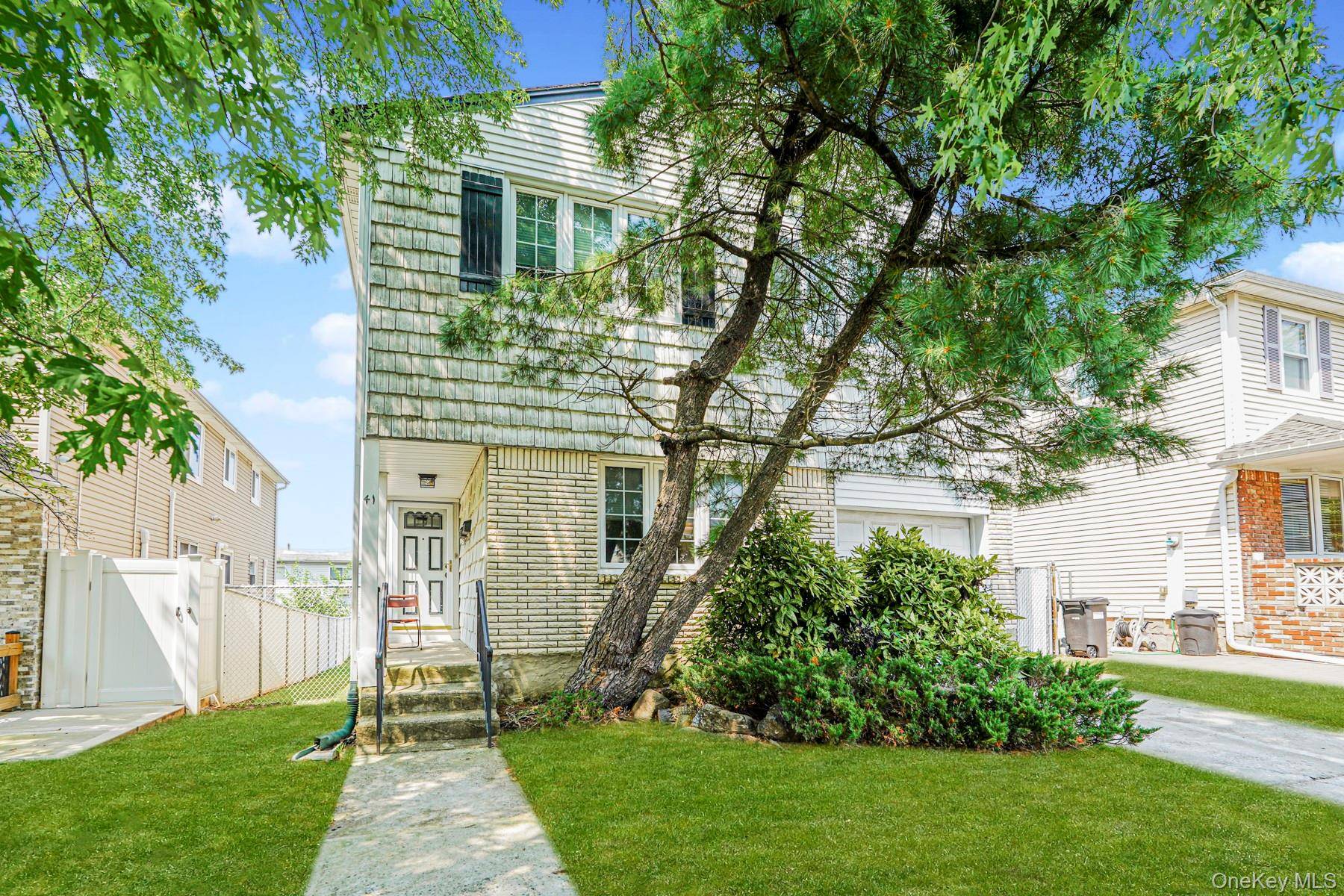 Run don't walk to this two family in Eltingville priced to sell !