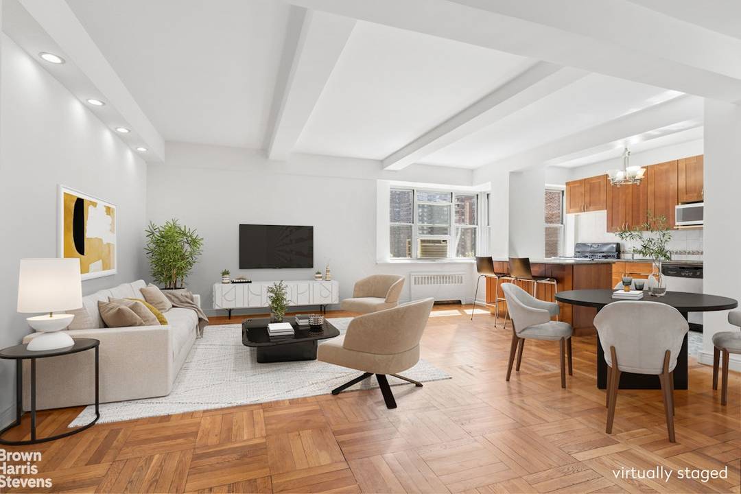 Enter via an inviting foyer opening to an expansive living dining with 5 windows 4 east facing and 1 south facing serving up excellent morning and midday light !