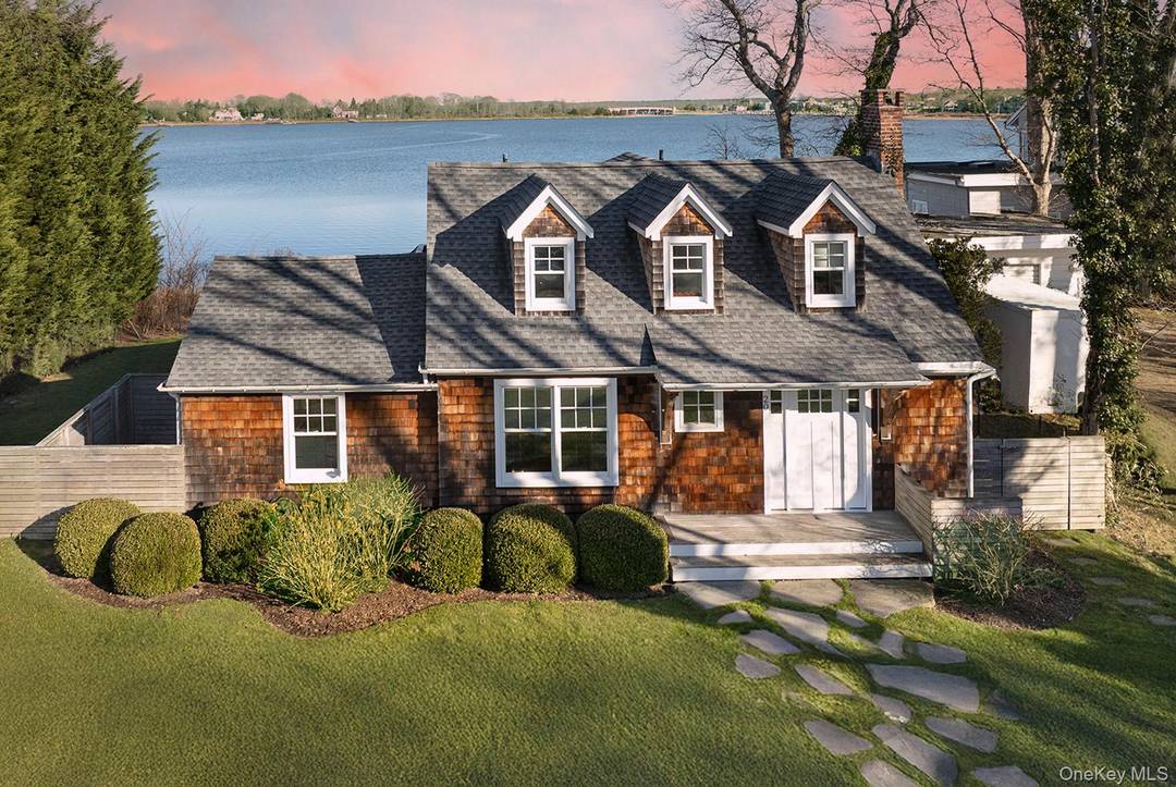 An Iconic Sag Harbor view set along the coveted shoreline of Sag Harbor Cove.