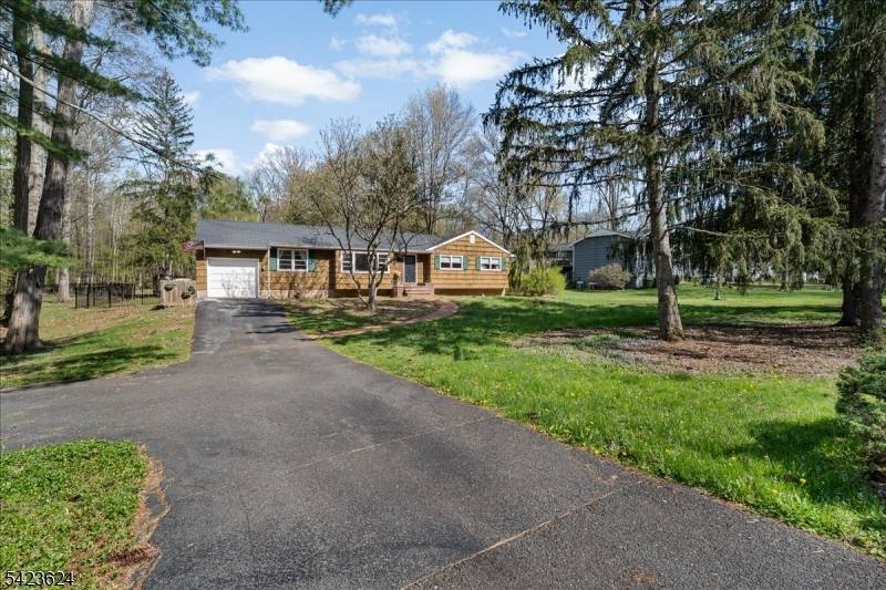 Spacious 4 bedroom, 2 bath ranch style home on a quiet street, offered partially furnished for added convenience.