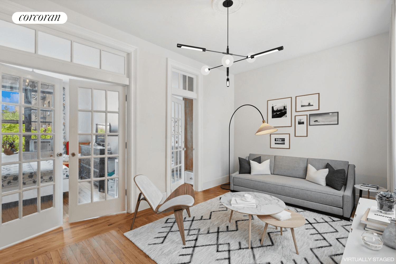 Move right in. Renovated, sunny corner apartment has windows in every room, open city and tree top views, plus east, south and west exposures providing light all day.