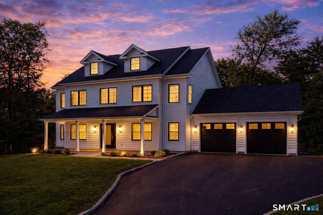 Brand new construction at 511 Den Road offers refined modern living in a peaceful North Stamford setting on 1.