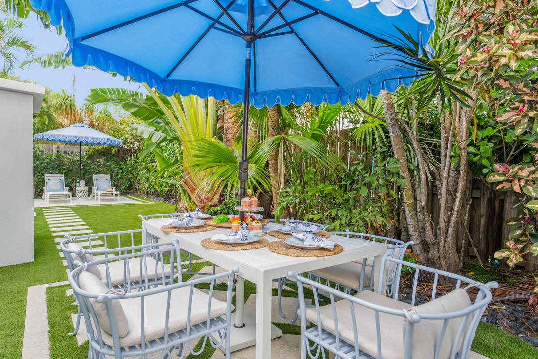 Escape to coastal bliss in this beautifully remodeled beach cottage, just steps from the sand and surf.