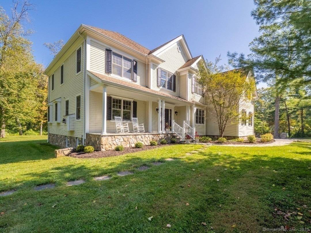 Exceptional custom home in the premier Ridgefield commuting location !