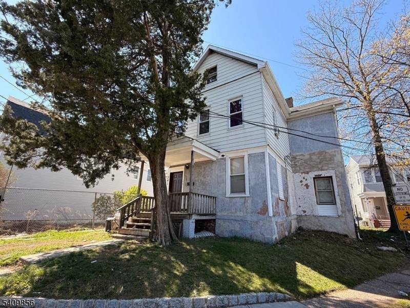 Legal 3 family home with separate utilities.