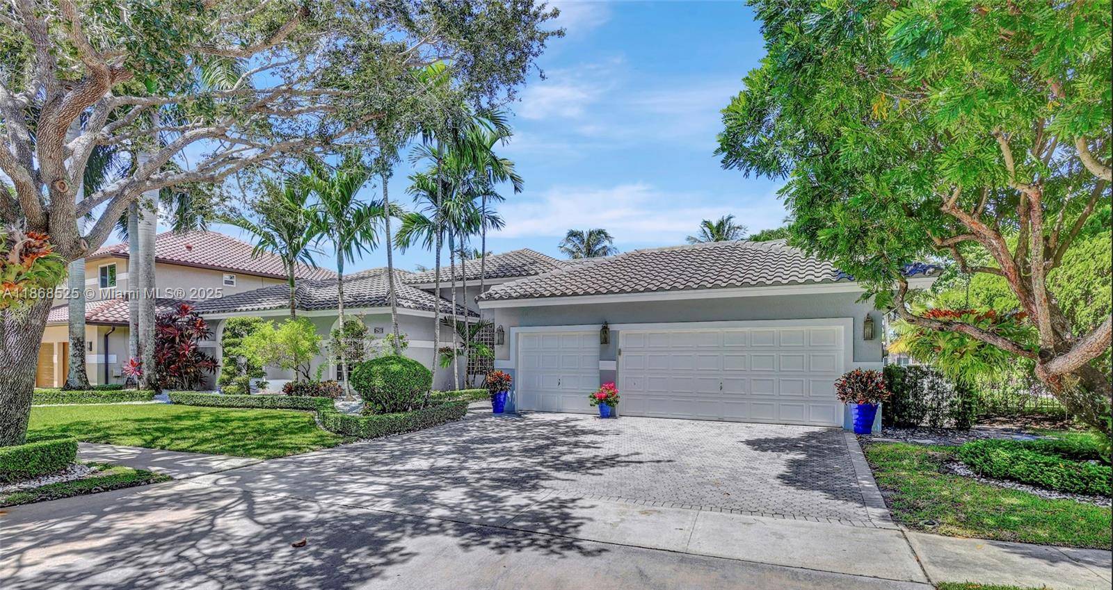 Welcome to your one story private waterfront retreat in the exclusive Sunset Pointe at Silver Lakes, Pembroke Pines.