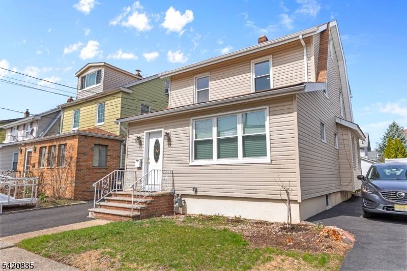 This beautifully renovated Hillside home is move in ready, featuring newer siding and roof within the last 10 years, a spacious finished basement, a large 2 car garage, and a ...