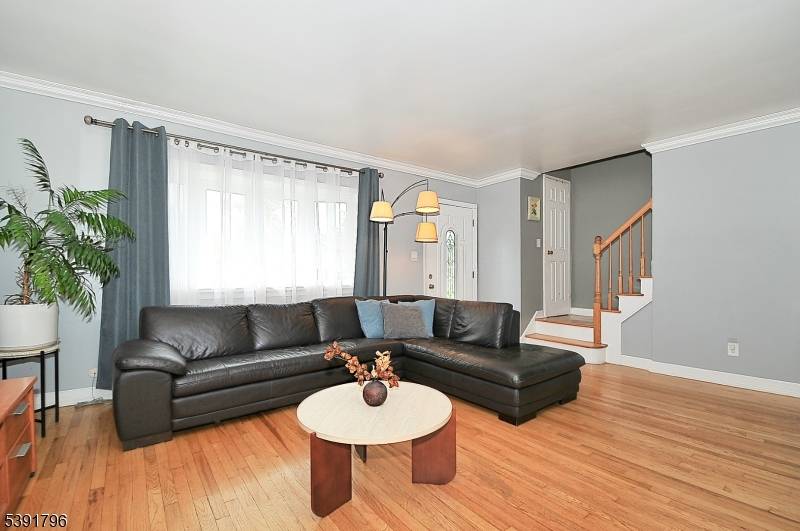 Pride of ownership ! Beautiful cape cod with 4 bedrooms, 2 full baths and one car garage.