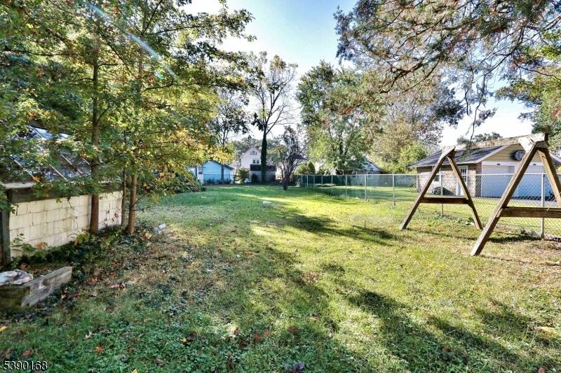 Welcome to this beautiful single family home situated on an oversized 50x200 lot in the heart of Roselle Park.