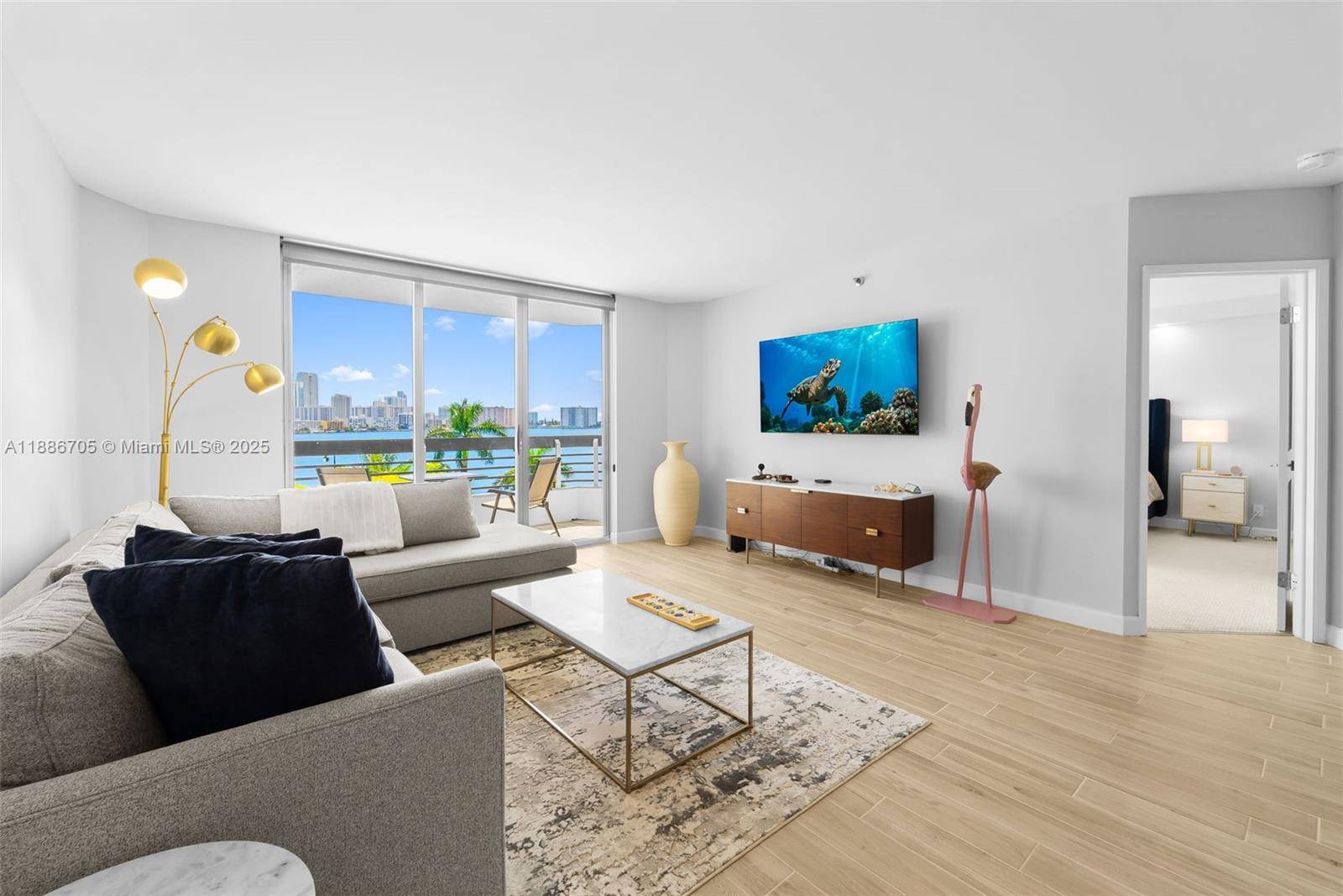 Bright and beautifully renovated waterfront condo in Mystic Pointe, Tower 300 Residence 614.