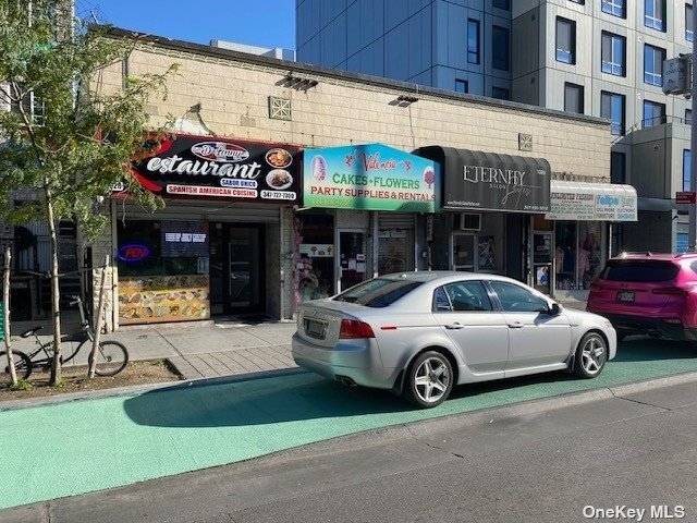 Four stores fully occupied, busy location in shopping area.