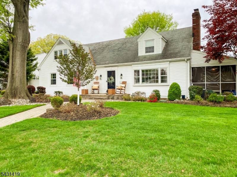 This distinctive custom oversized Cape Cod blends timeless charm with thoughtful modern upgrades across four bedrooms and two full baths.