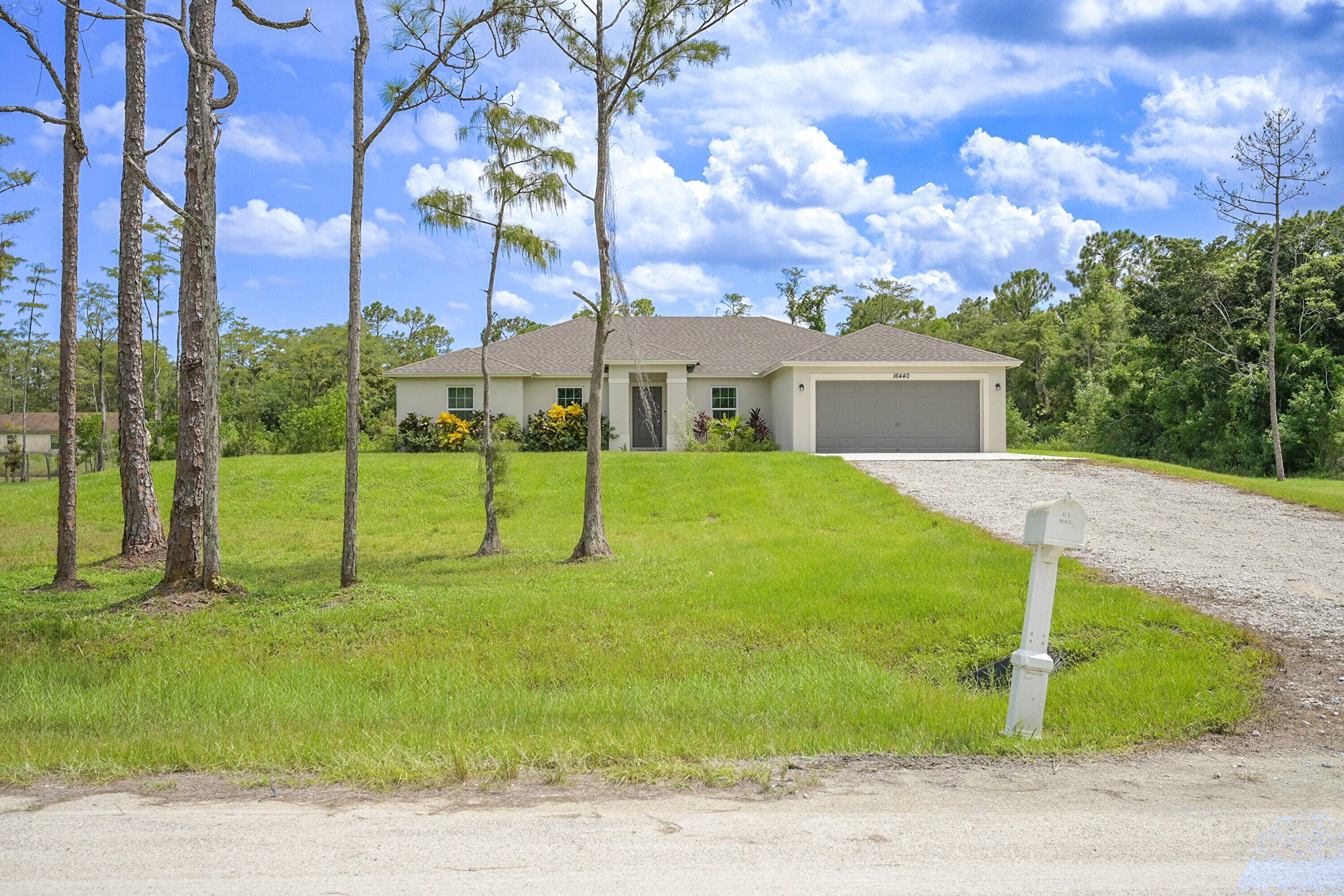 Awesome Acreage Home ! 2022 constructed, Single Story, 4 bedroom 2 Full Bathroom split bedroom CBS home situated on an elevated 1.