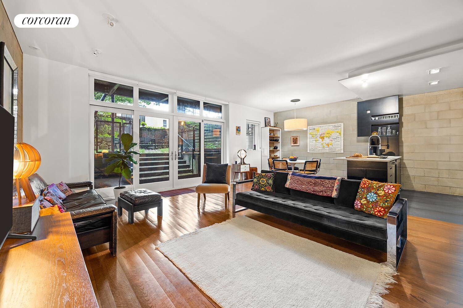 This 1, 700 square foot duplex offers a rare townhouse alternative, quietly set on one of Greenwood's most beautiful blocks.