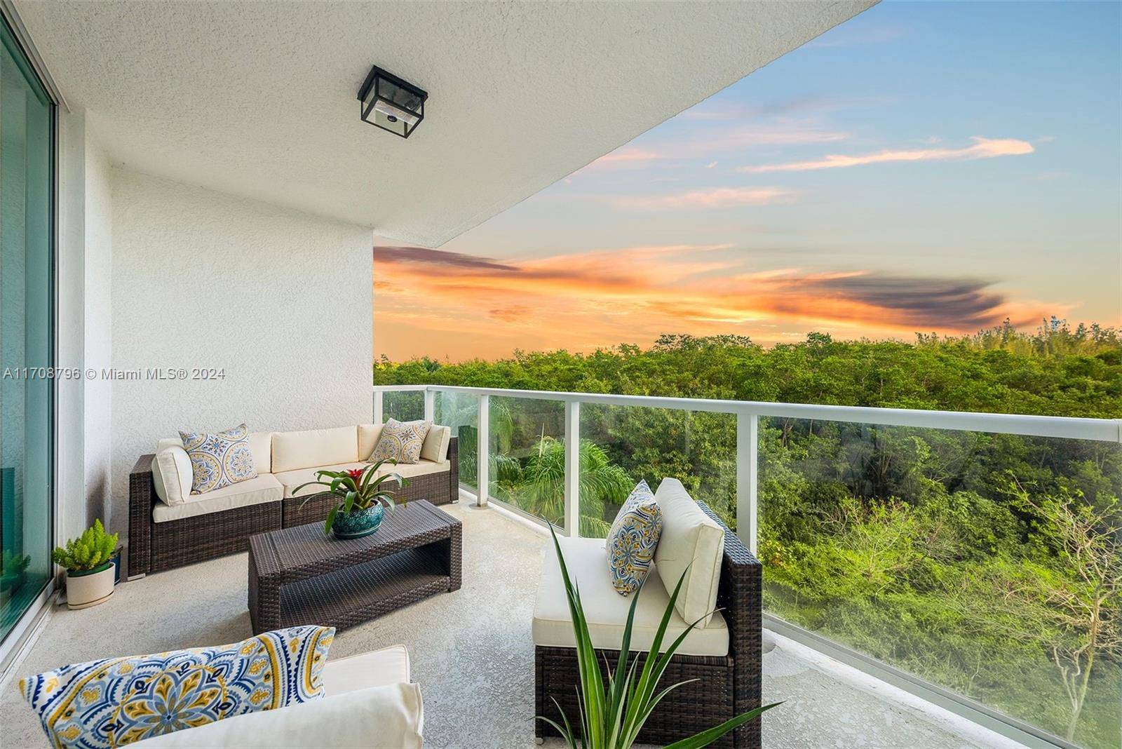 Spacious, upgraded 2 2 with large new glass private balcony with serene views of Oleta State Park.