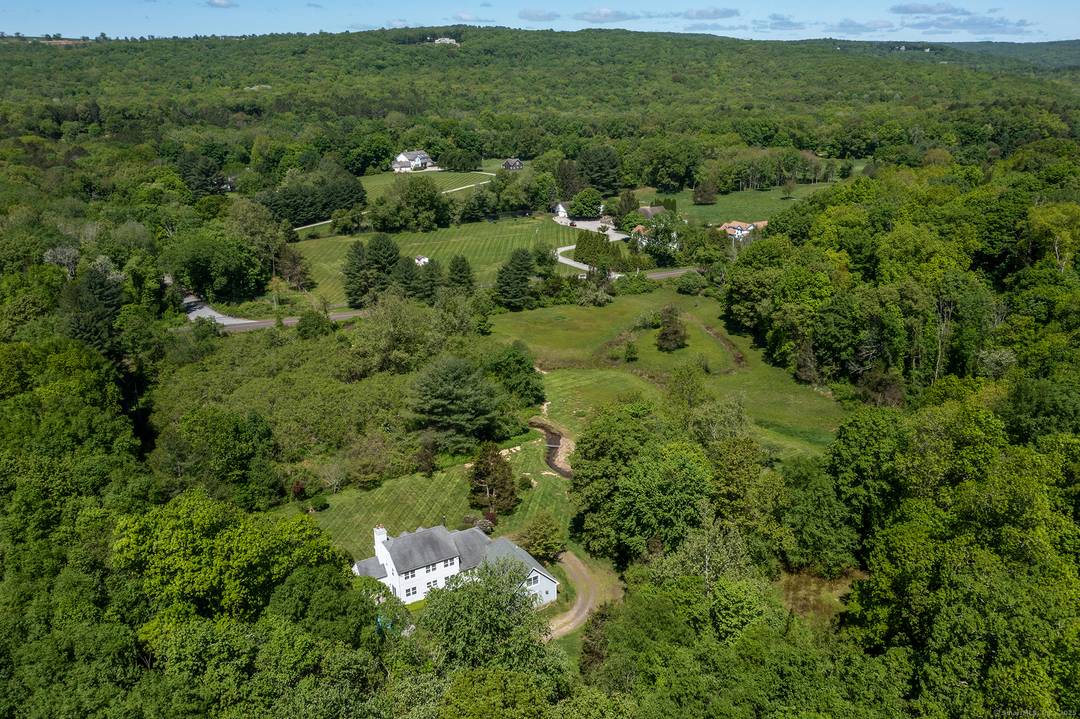 Discover this charming 4 bedroom Colonial with 1 additional bedroom is attached in law apt on the southern side of Roxbury, offering an idyllic escape with seamless access to NYC.