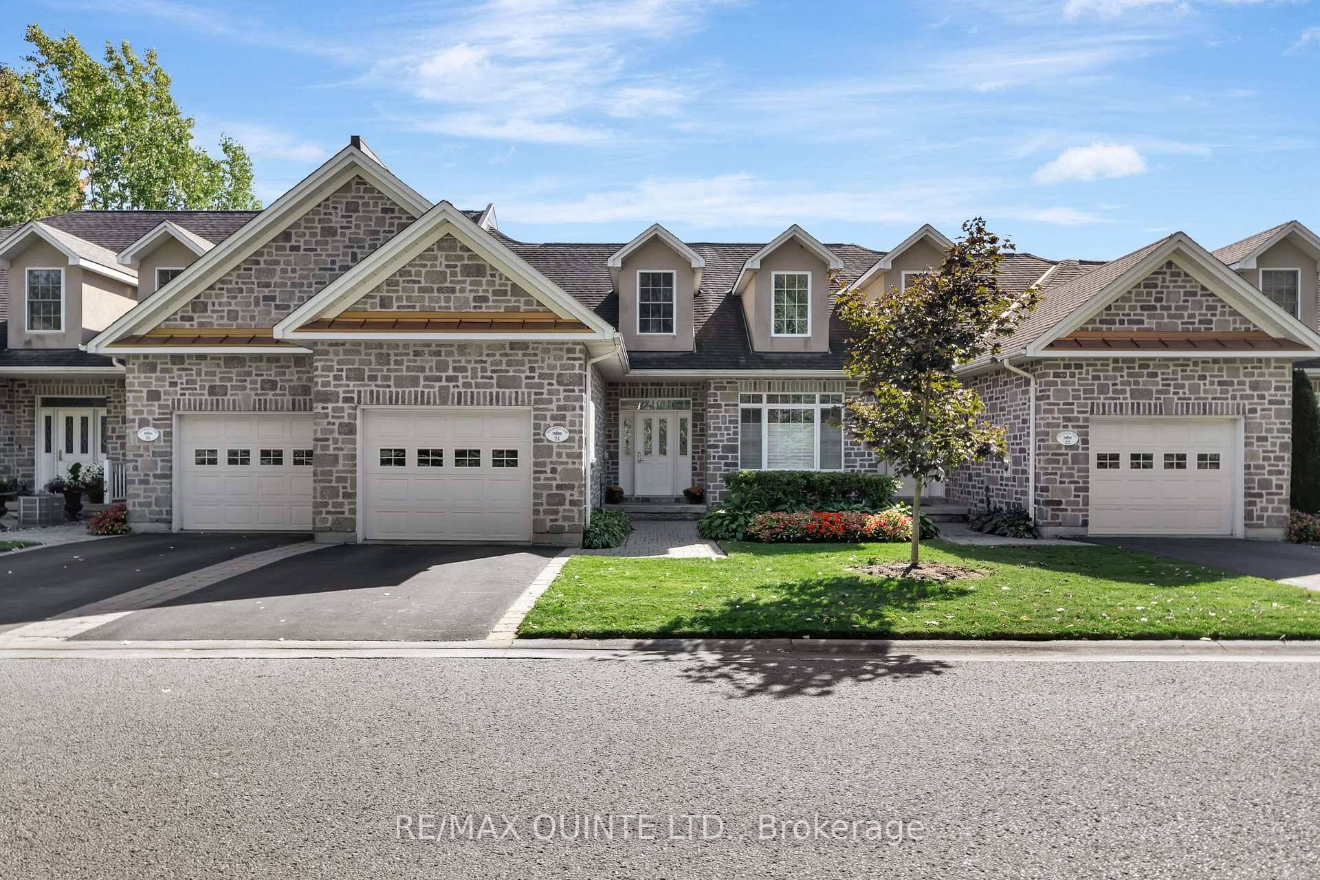 Welcome to 24 Gracefield Lane, where refined living meets the tranquility of waterfront life.