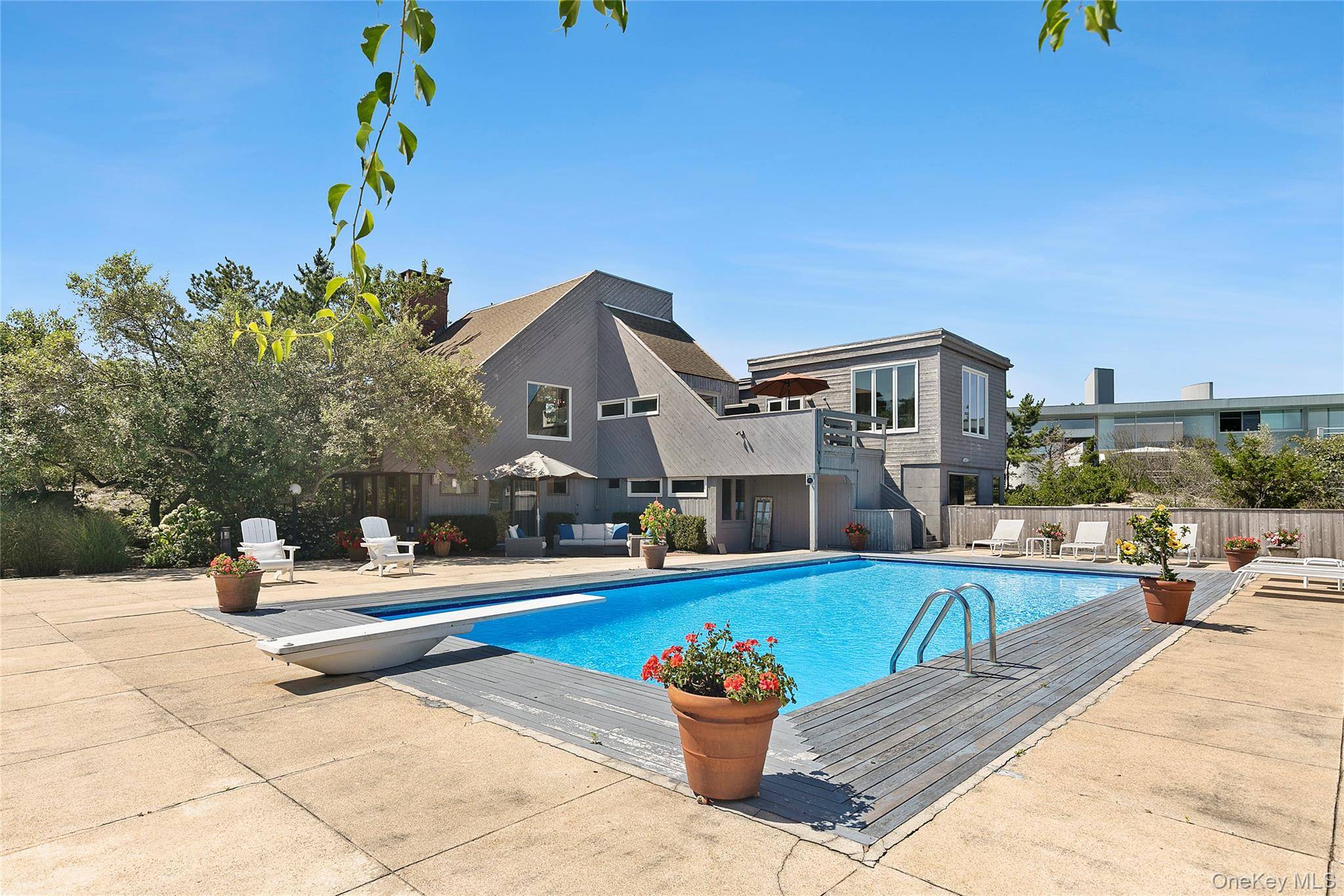 Set on 0. 69 acres, bordering a two acre dune preserve, this large 2, 548 sq.