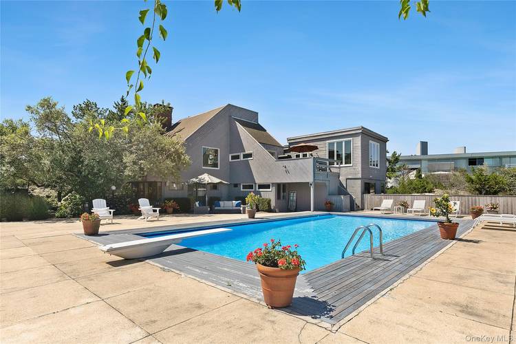 Set on 0. 69 acres, bordering a two acre dune preserve, this large 2, 548 sq.