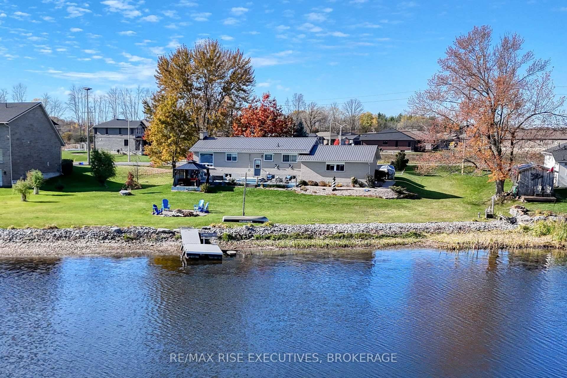 Experience exceptional waterfront living on the beautiful Napanee River, offering panoramic views, calm waters, and a rare flat, gently sloping property leading right to the shoreline.