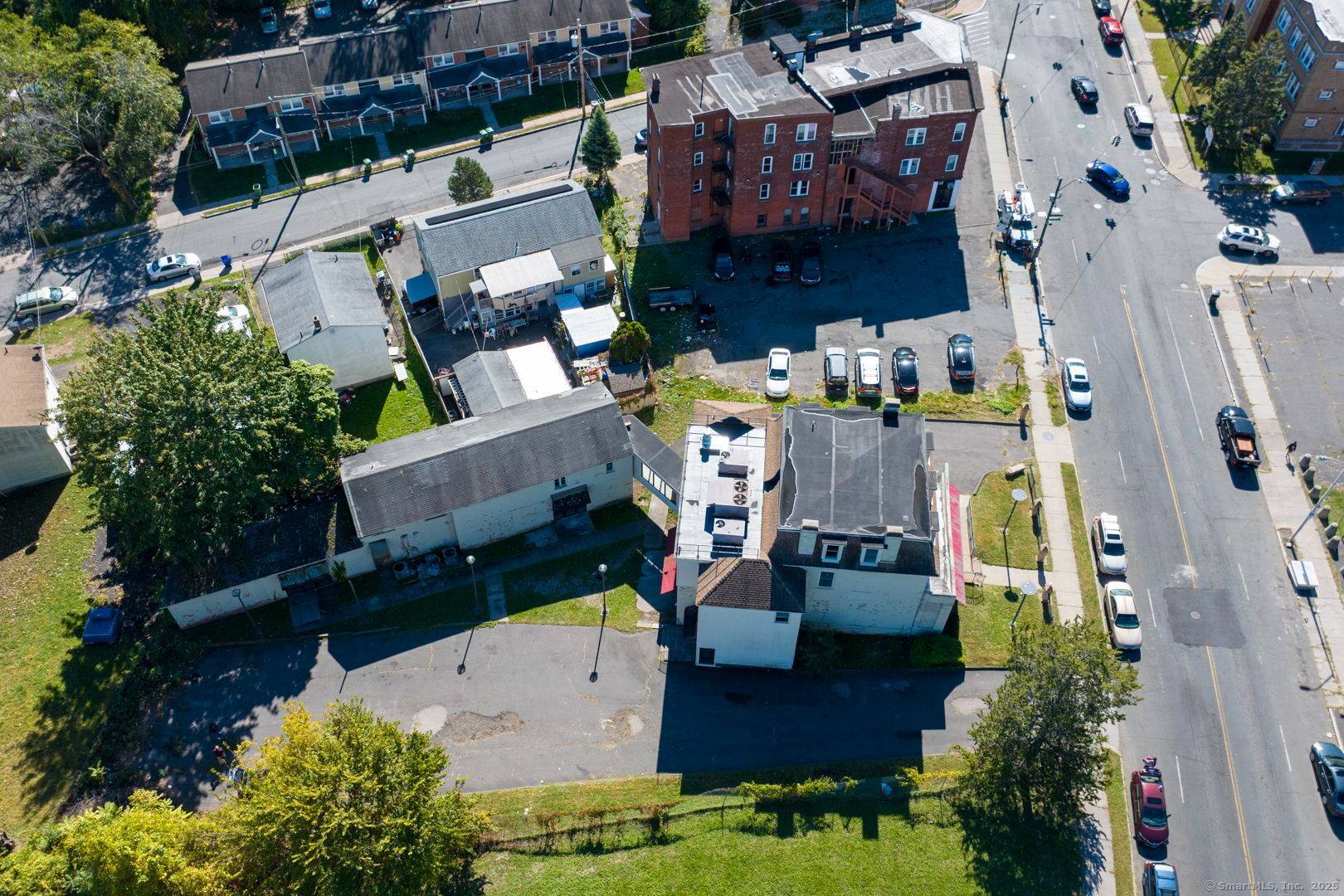 Step into a legacy of style, wellness, and community at 2404 Main Street, a multi level commercial gem in the heart of Hartford.