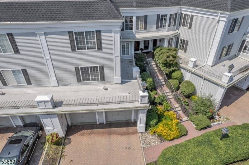 Welcome to this beautifully maintained 2 bedroom, 1 bath townhouse in Sutton woods, a highly desirable community in Chatham, NJ.
