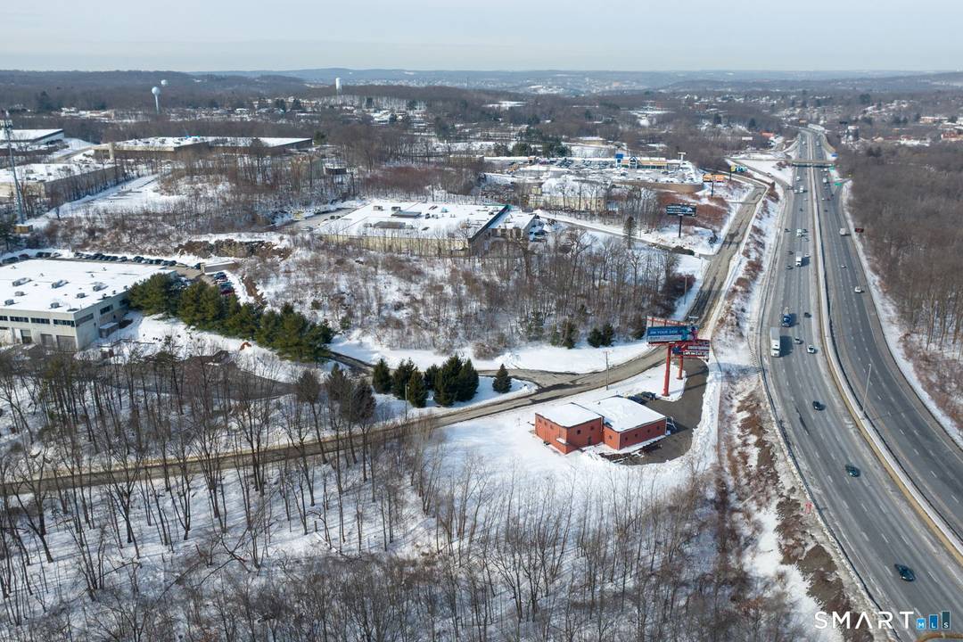 This prime commercial space is located conveniently right off of I 84 just over the Waterbury line from Cheshire.