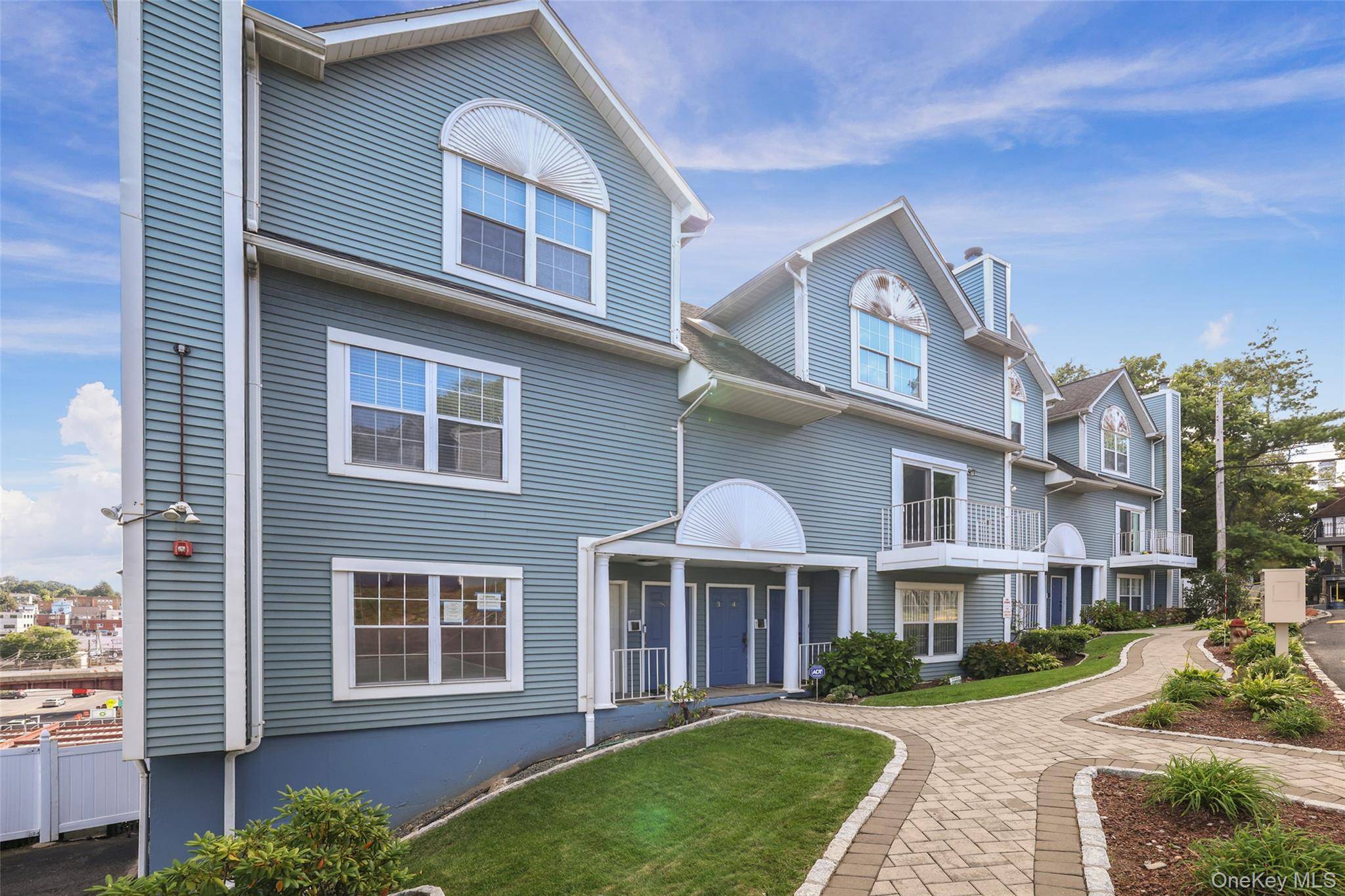 Welcome to Nob Hill Drive, a meticulously maintained townhome style condo in the heart of Elmsford.