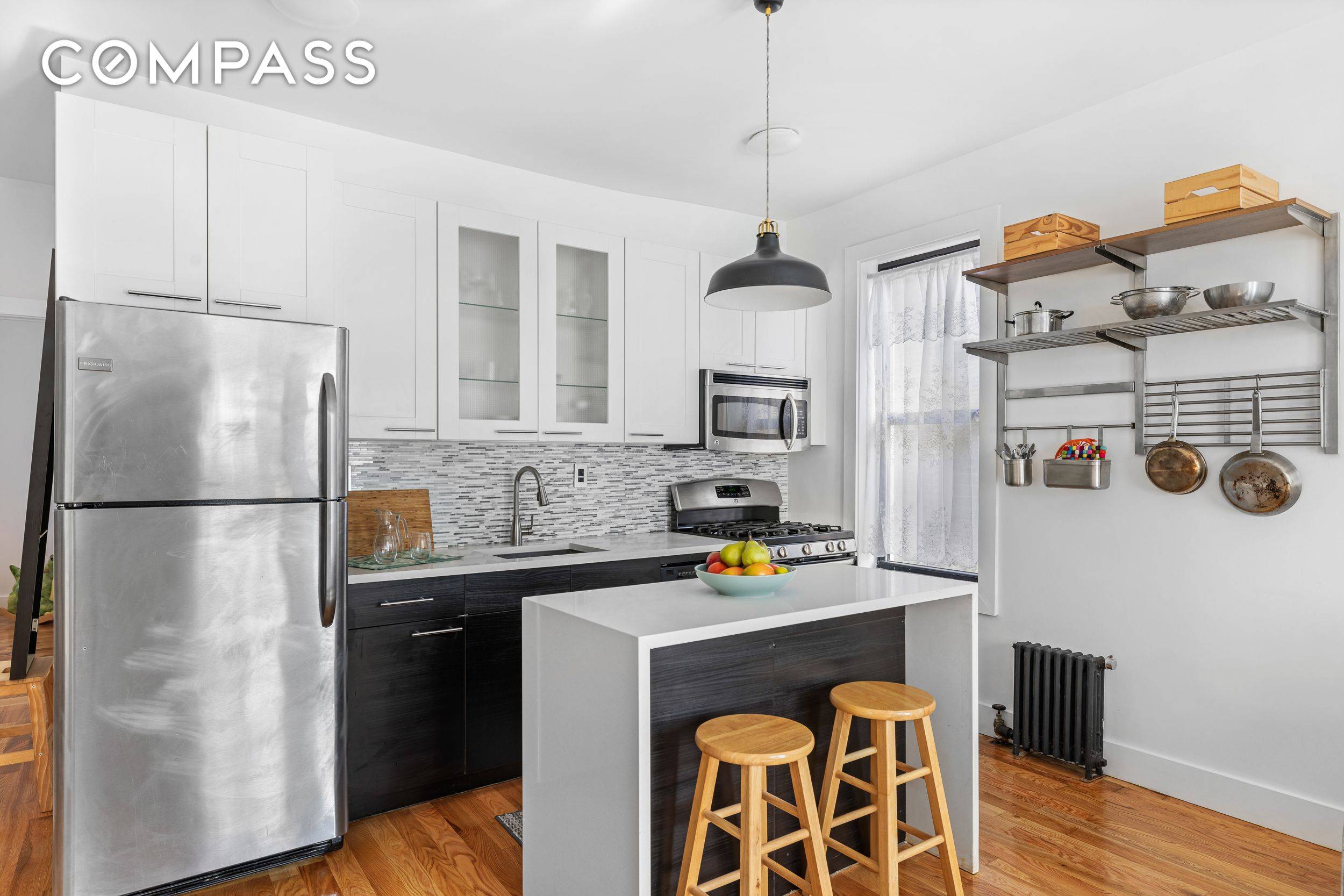 Home sweet home ! Sunny, two bedroom, pet friendly condo located in picturesque Midwood.