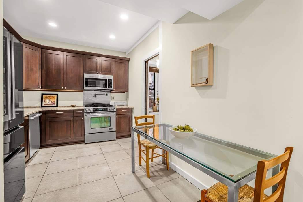 Tucked away at the rear of a picturesque prewar elevator coop, this unique and inviting 700 sq ft home offers a rare blend of character, space, and functionality.