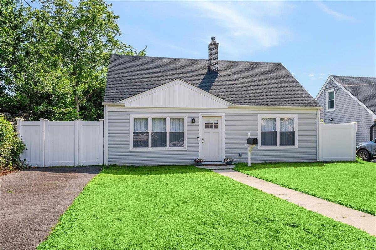 Stylishly renovated 3 bedroom cape located in the heart of Babylon Village.