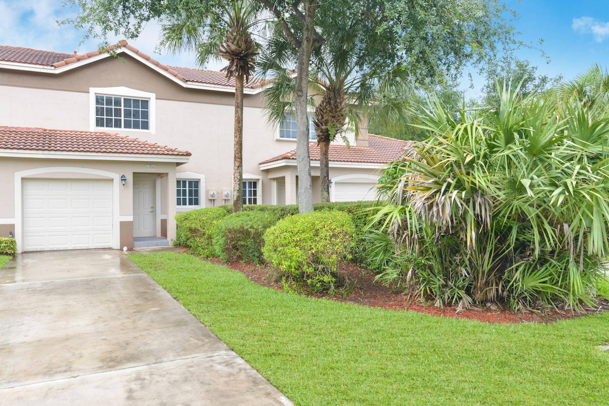 Spacious 3BR 2. 5BA two story townhome in Green Cay Village with 1, 361 sq ft of interior living space.