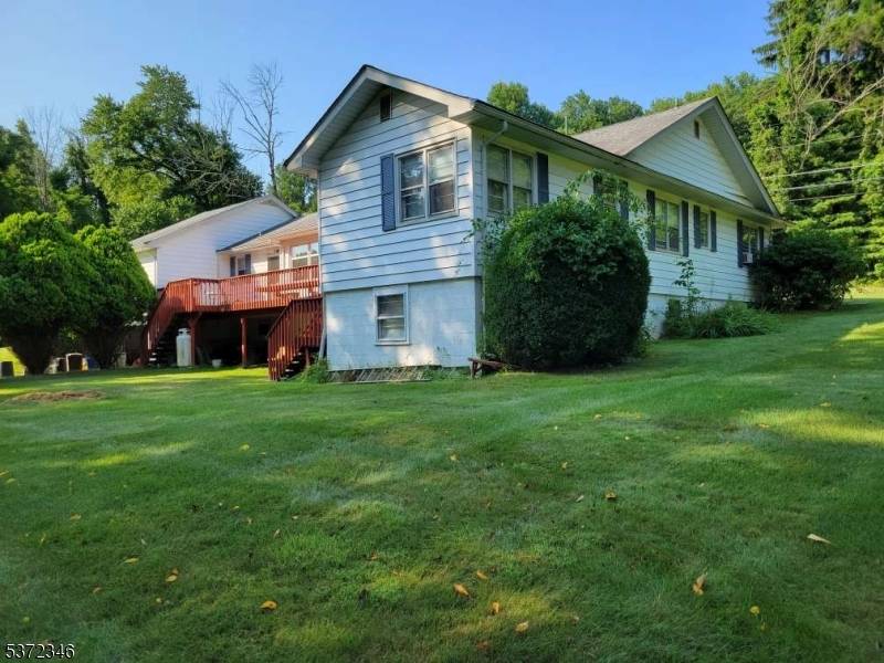Large 5 BR 3 BATH home with ideal Mother Daughter potential on the huge ground level with separate entrance.