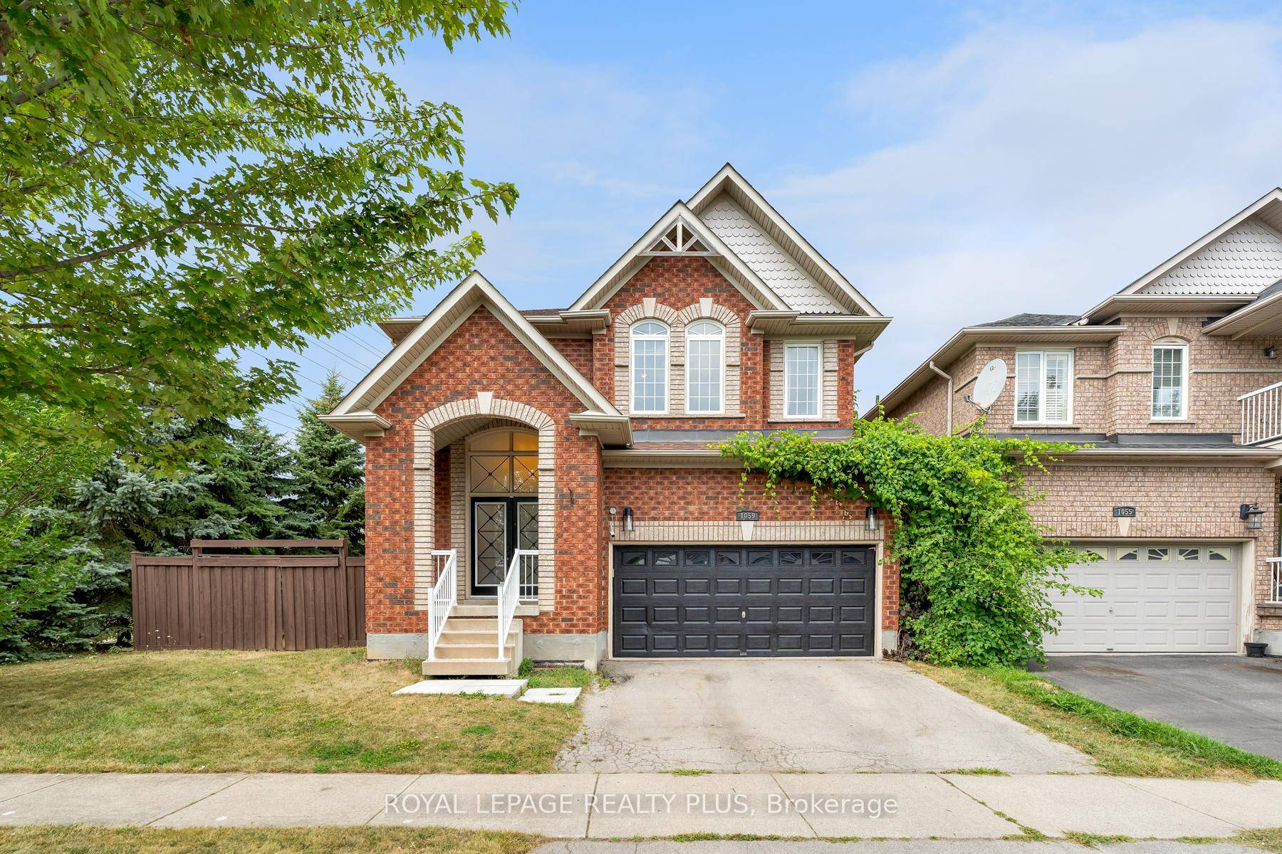 Simply stunning ! This impeccably maintained home with over 3300 sq ft total living space is perched at the edge of a crescent in the charming Clarke neighborhood.