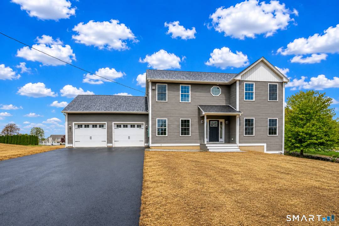 Be the first to live in this newly built modern Colonial located in Bristol's Chippens Hill area, offering expansive sky views and a thoughtfully designed layout throughout.