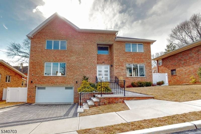 Welcome to this exquisite 5 bedroom, 7 bathroom luxury home in Cliffside Park, NJ, offering unparalleled elegance and stunning views of the New York City skyline from the rooftop.
