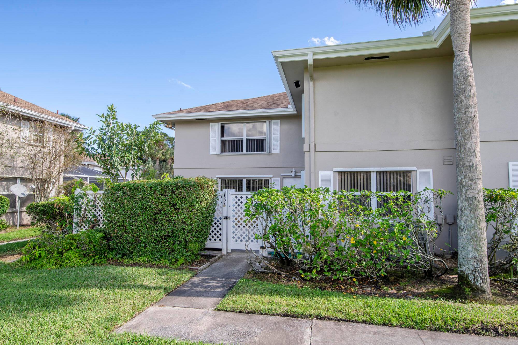 Lakefront Stamford model in the highly sought after community of Sunset Trace in the heart of Palm City.