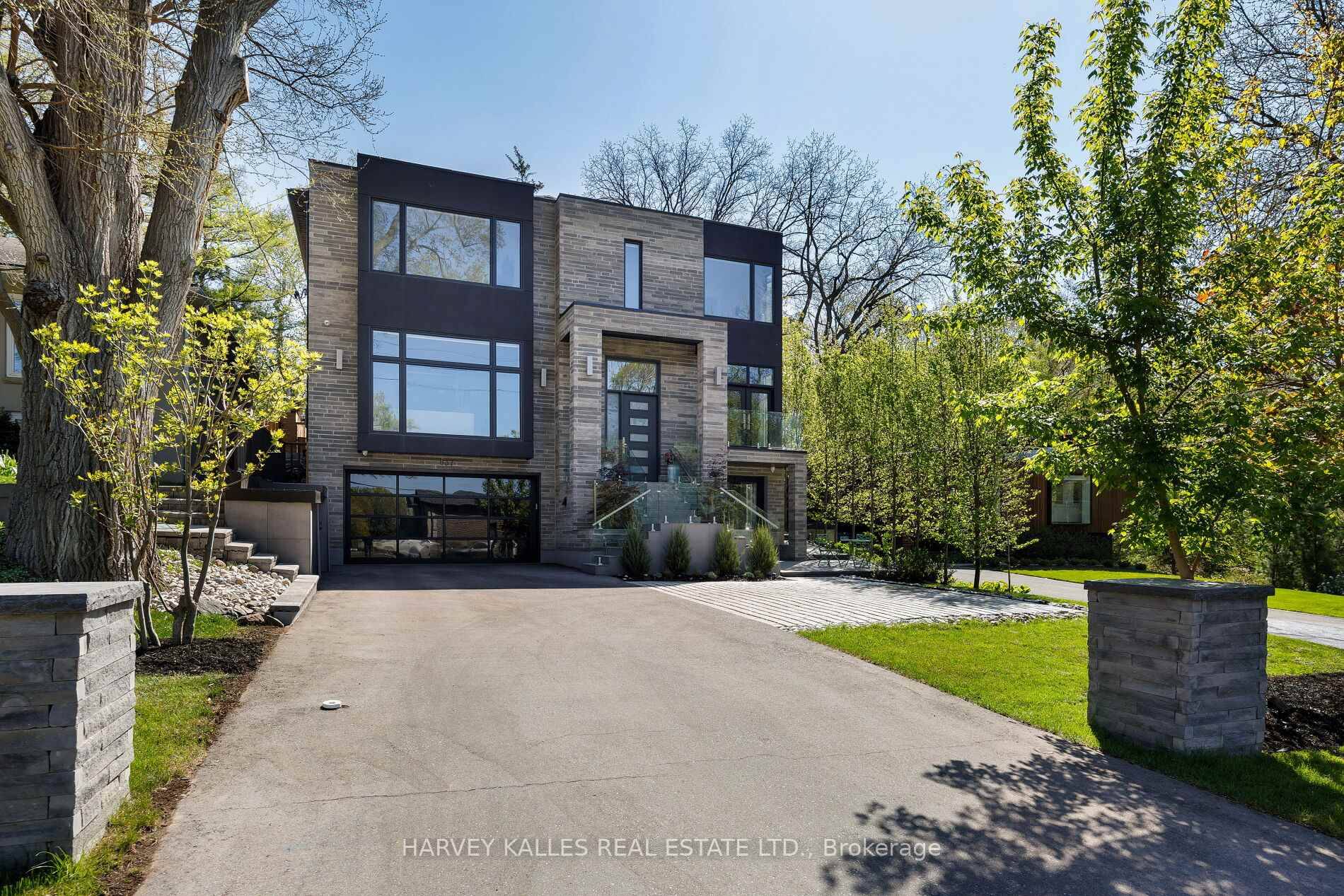 This modern masterpiece at 837 Royal York Road is an architectural triumph, with stunning craftsmanship and floor to ceiling windows that flood each room with natural sunlight.